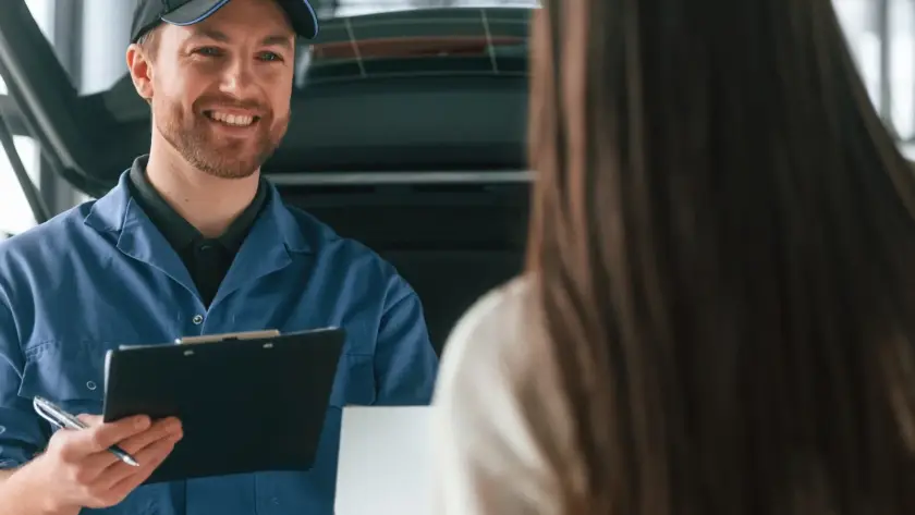 Mobile mechanic speaking with a Revilo Customer — on-demand car service by Revilo Auto Care