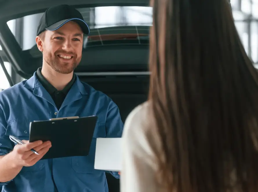 Mobile mechanic speaking with a Revilo Customer — on-demand car service by Revilo Auto Care