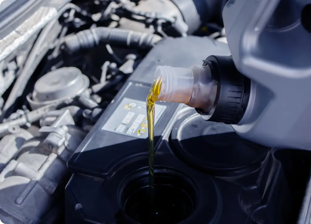 7 Essential Car Services You Can Book From Your Phone An image of an oil change service - on-demand car service by Revilo Auto Care